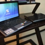 sleek-black-wooden-workdesk-laptop-LCD-monitor-table