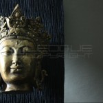 buddha-gold-head-in-wood-panel