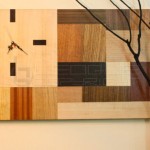 stylish-wall-clock-on-large-wood-panel-with-abstract-veneers-pattern (1)