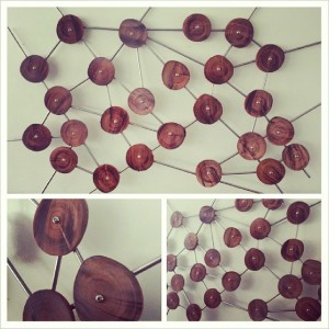 constellation wood cuts and steel wall accent