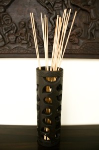 decorative sticks in wood vase