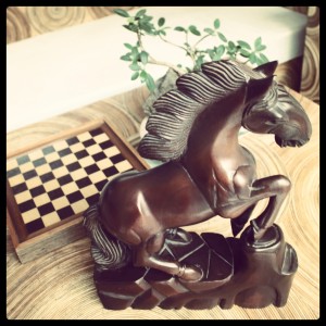 carved wood horse
