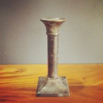 Antique-look metal candle stand