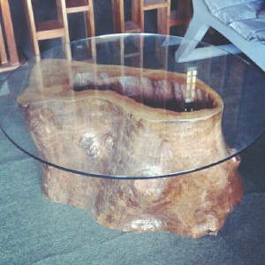 Wood trunk center table with round glass top