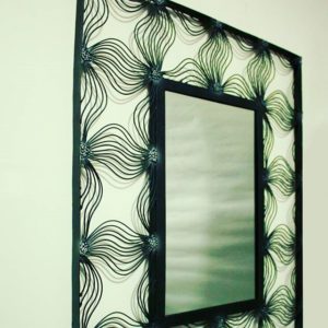 Metal floral mirror, gray and black finish
