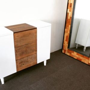 White and natural wood cabinet and mosaic mirror