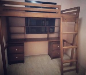 Wooden bunk bed with study area desk